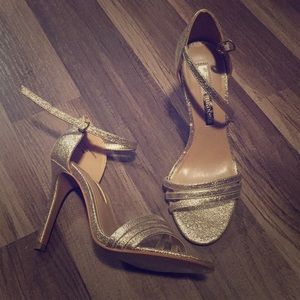 Audrey Brooke gold heels